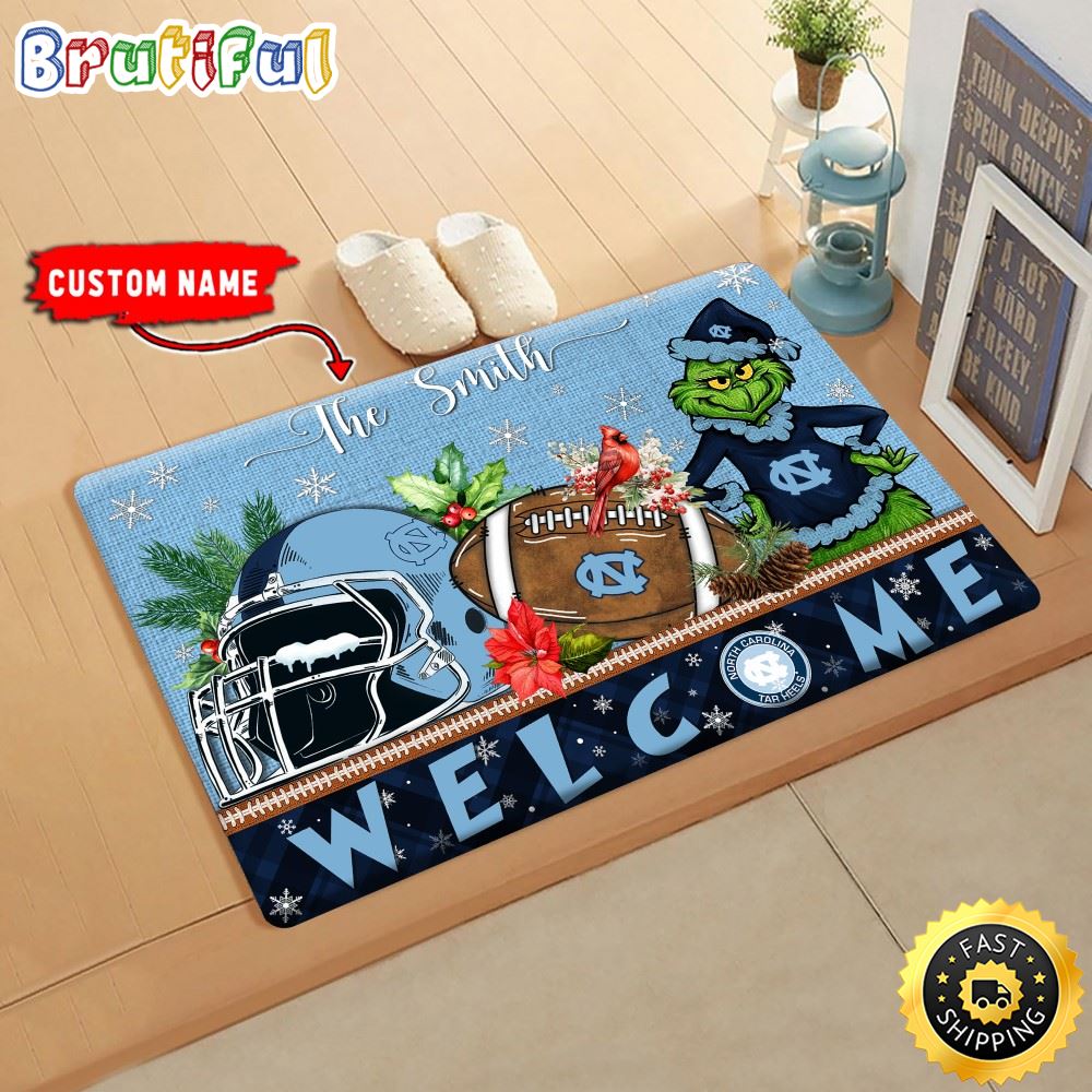 Sportswearmerch North Carolina Tar Heels NCAA Grinch Christmas Doormat For Fan
