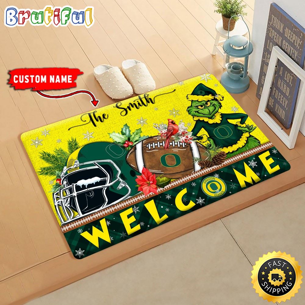 Sportswearmerch Oregon Ducks NCAA Grinch Christmas Doormat For Fan
