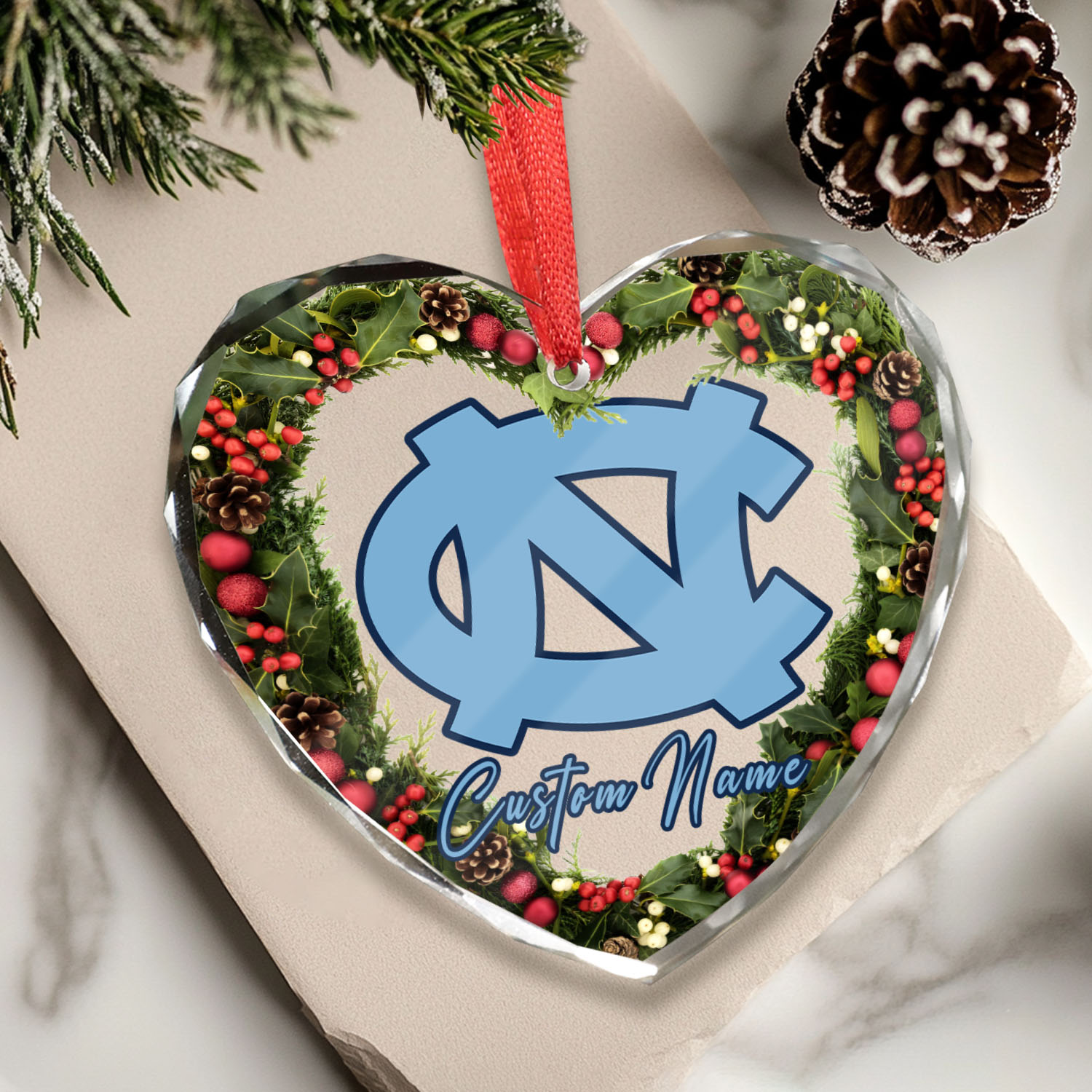 Sportswearmerch North Carolina Tar Heels NCAA x Christmas Glass Ornament Gift For Fans