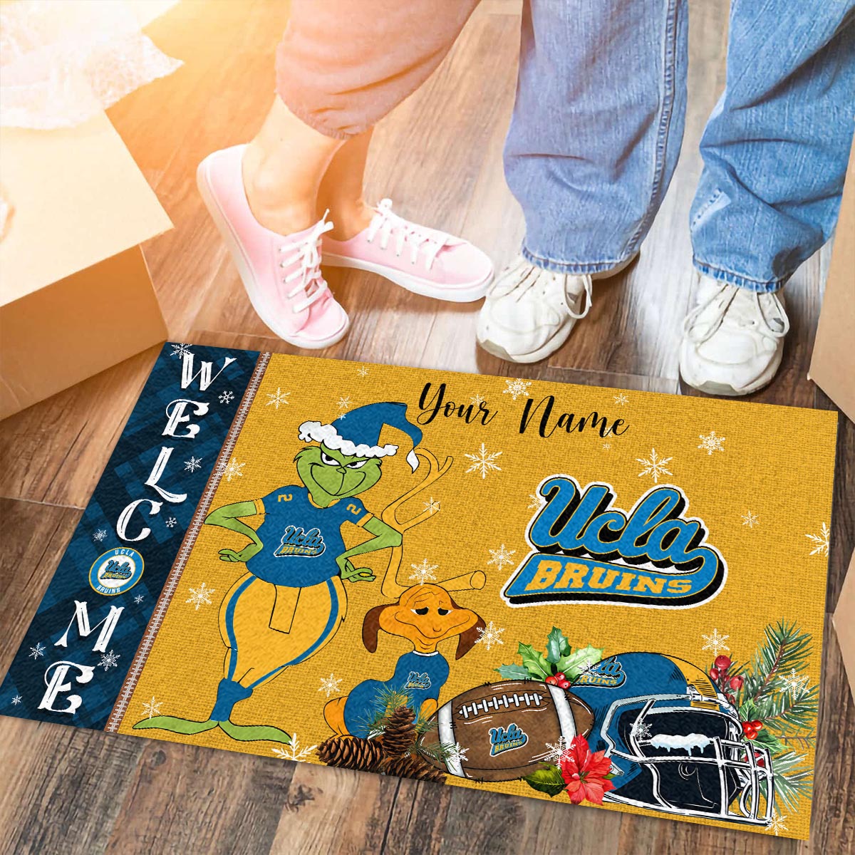 Sportswearmerch UCLA Bruins NCAA x Grinch Christmas Welcome Football Doormat For Fan